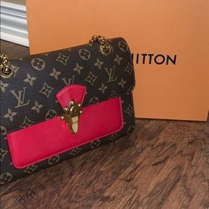 Louis Vuitton Victoire Handbag